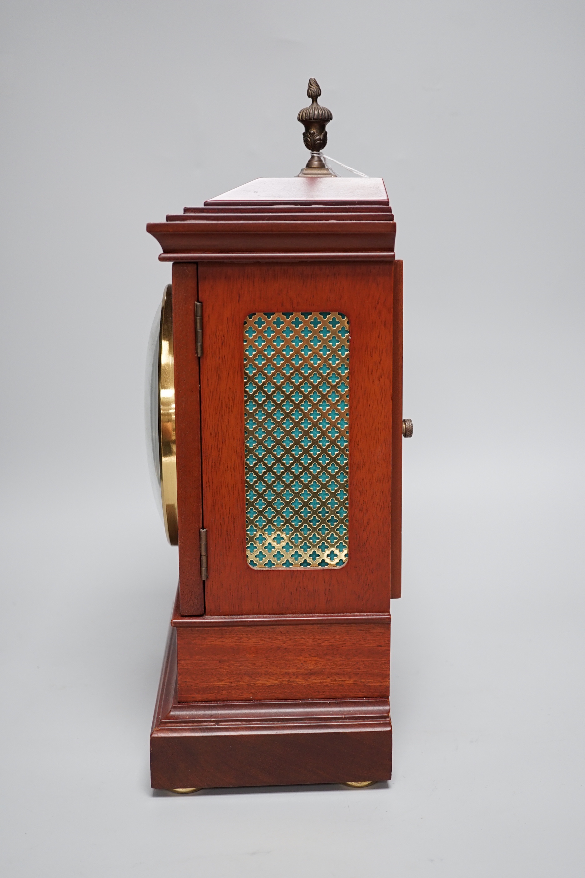 Sewills, Liverpool. An inlaid mantel clock with three train balance escapement movement, chiming on eight gongs, 37cm high